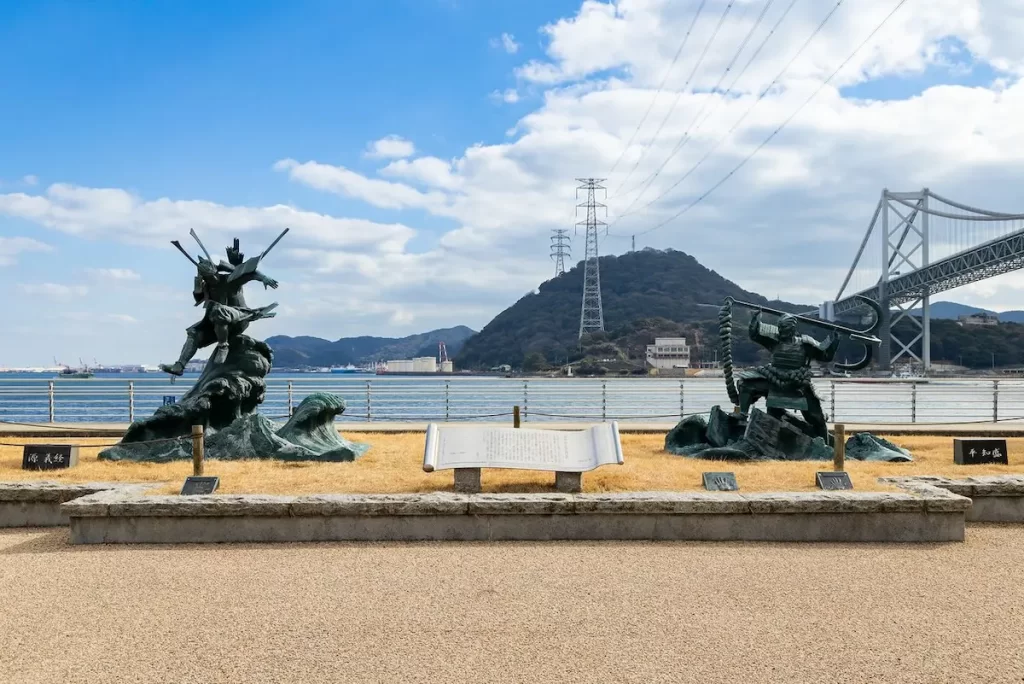 Site of Battle of Dan-no-ura with statue of Minamoto no Yoshitsune (left) and statue of Taira no Tomomori